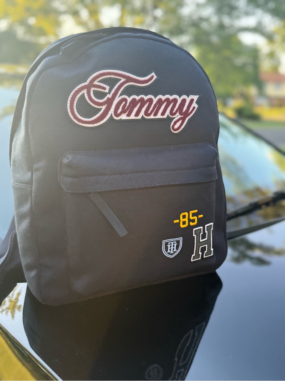 Tommy Hilfiger Black Backpack with Maroon Script Patch